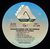 Graham Parker And The Rumour - Squeezing Out Sparks LP levy (käytetty)