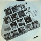 Graham Parker And The Rumour - Squeezing Out Sparks LP levy (käytetty)