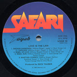 Toyah (3) - Love Is The Law LP levy (käytetty)
