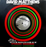 Magic's In The Air / Boy, I Really Tied One On / You Keep Me Hanging On
